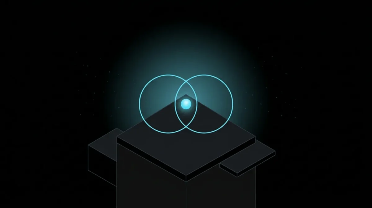 Two interlocking rings with a glowing sphere at their overlap